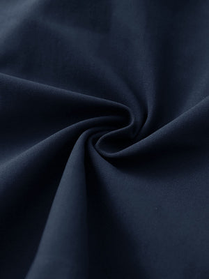 Fabric detail of 4-way stretch performance solid shorts with flexible feel in navy