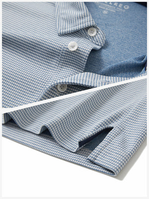 Detail shot of collar and hem of white light blue grid ultra-light quick dry moisture wicking collared polo shirt