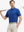 Full body front view of model wearing COBALT Your Favorite Jacquard Polo, holding a golf club