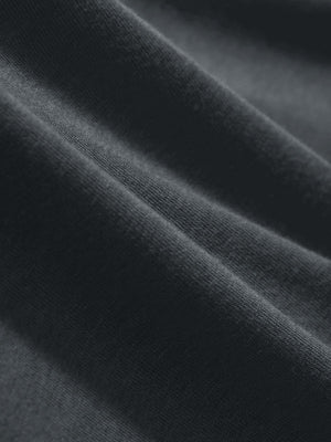 Macro view of the greystone heather comfy cotton blend polo shirt with pocket fabric, showcasing the smooth texture