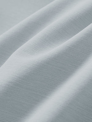 Close-up texture of newport blue straight fit lightweight dress golf pants fabric showing detailed lightweight weave and material.