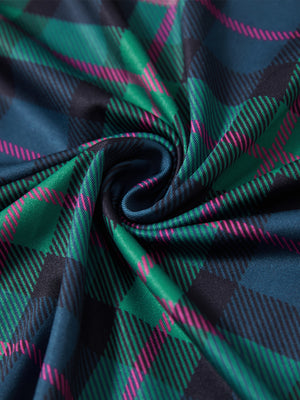 Close-up fabric detail of lightweight print long sleeve polo, breathable texture and soft feel in dark plaid