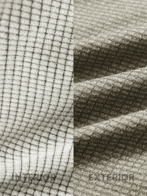 Close-up of melange fabric on warm fleece golf hoodies pullover, showing texture and detail in dust beige melange.