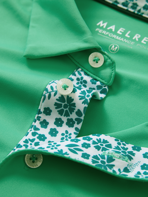 Detail of the collar opening on the irland green everyday classic solid polo, emphasizing the structured neckline design