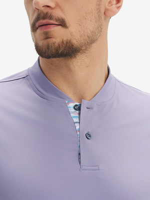Close-up of model in lavender moisture-wicking short sleeve henley shirt, nose to chest front view.
