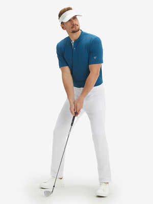 Full-body front: model in blue moisture-wicking short sleeve henley shirt addressing golf ball.