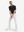 Full-body front: model in black moisture-wicking short sleeve henley shirt addressing golf ball.