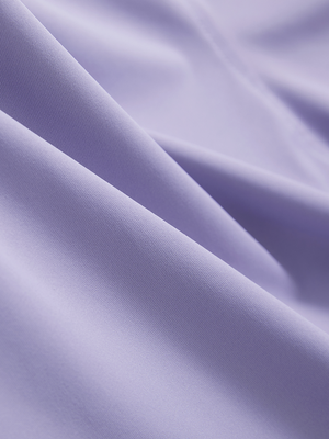 Close-up of lavender Moisture-Wicking Short Sleeve Henley Shirt fabric texture.