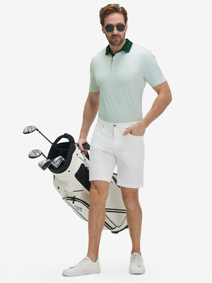 Full front: model in white green lines lightweight stretch upgraded print golf polo shirts holding golf bag.
