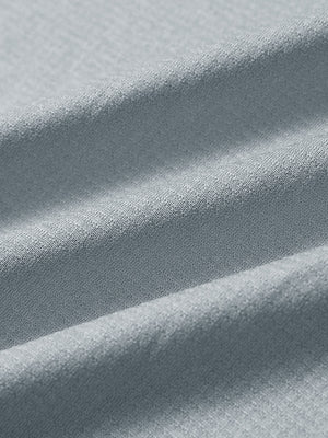 Close-up of lunar rock melange moisture wicking quarter zip pullover fabric texture